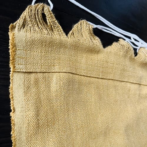 Hamac en lin moutarde coutures